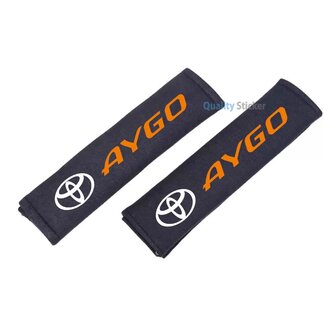Toyota Aygo 1 oranje gordelhoes