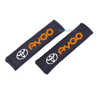 Toyota Aygo 2 oranje gordelhoes
