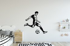 Voetballer schiet muursticker